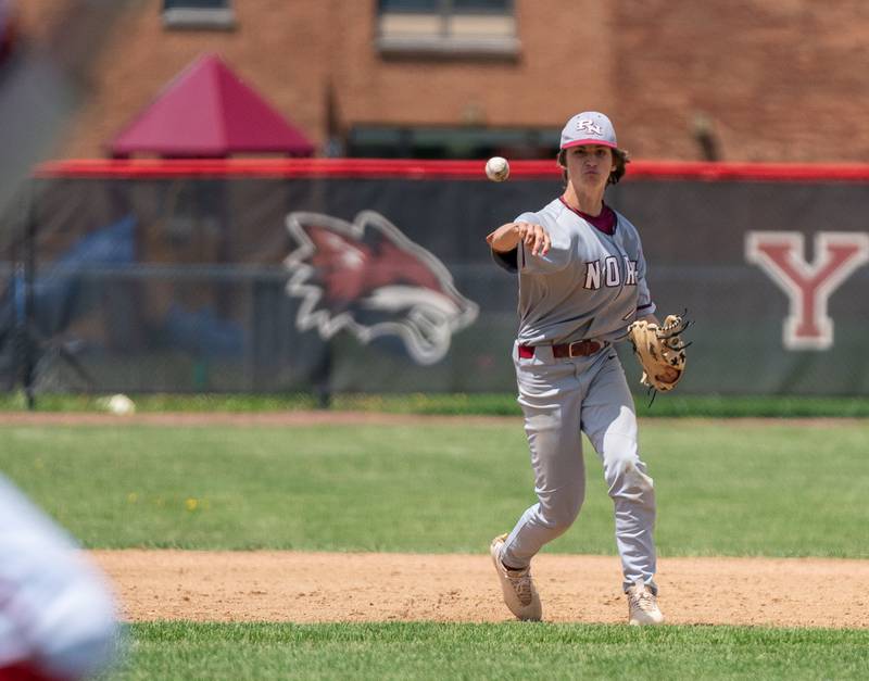 Plainfield North's Joseph Guiliano (7) fields a grounder and throws to first for an out against Yorkville during the Class 4A Yorkville Regional baseball final at Yorkville High School on Saturday, May 28, 2022.