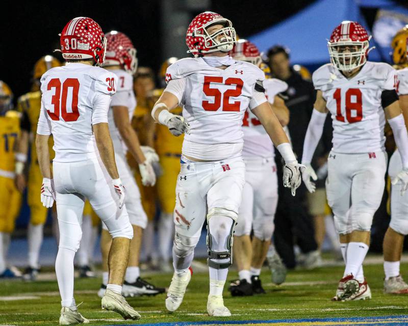 Naperville Central's Troy Kashul (52) reacts after a sack during Class 8A quarterfinal football game between Naperville Central at Lyons on Friday, Nov 15, 2024  in Western Springs.