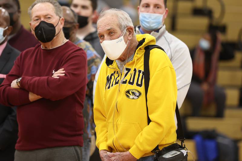 Rollie Bolattino stands at midcourt, former assistant and head coach for Lockport for 21 years, as the Lockport coaches and players were honored by the IBCA for reaching 1,500 victories as a program. Monday, Jan. 31, 2022 in Lockport.
