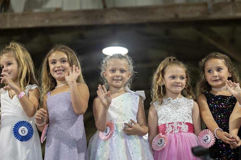 Little Miss Ogle County contestants wave from the stage Thursday, July 30, 2025, at the Ogle County Fairgrounds.