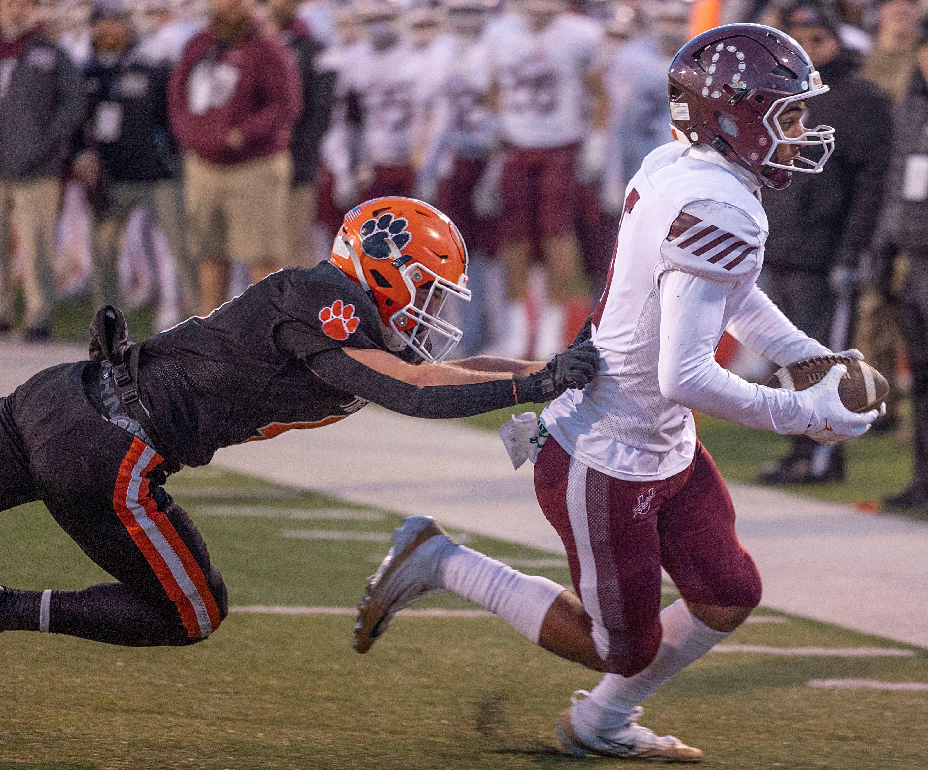 Tolono-Unity's Tre Hoggard gets into the end zone against Byron Friday, Nov. 28, 2025, in the Class 3A football finals at Hancock Stadium at ISU.