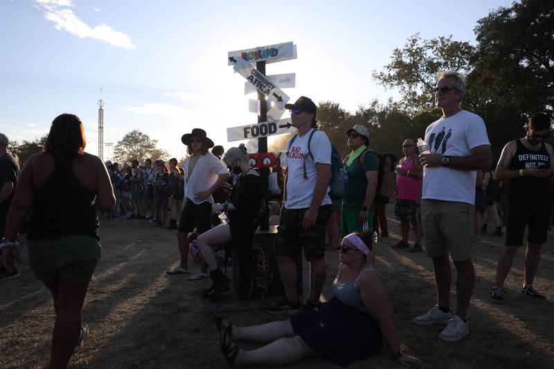 The sun sets as festival goers listen to Basement at Riot Fest on Saturday, Sept. 21, 2024 in Chicago.