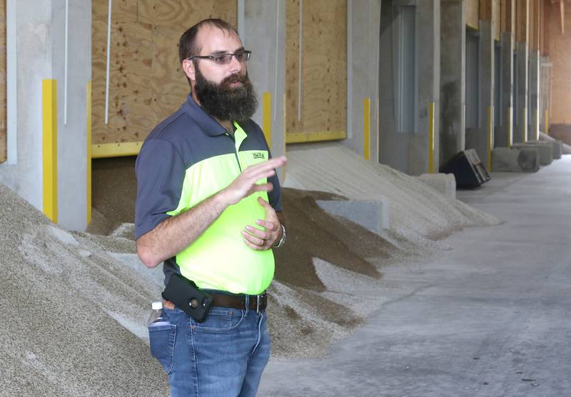 Adam Day, agronomy sales and marketing manager with Conserv FS in Waterman, talks Friday, Oct. 8, 2021, about the facility's new storage and loading capabilities during an open house at the location.