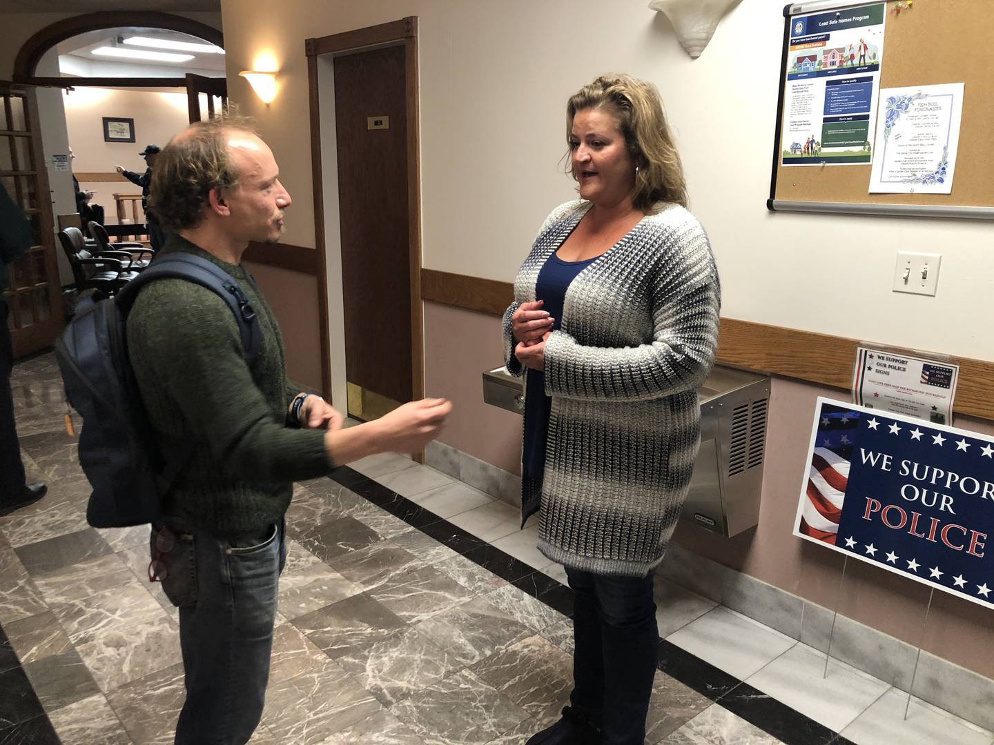 Zachary Zises, left, and Toni Wardanian, Richmond village president, discuss  Thursday's village board meeting following the plan commission's approval on Monday, Oct. 17, 2022.