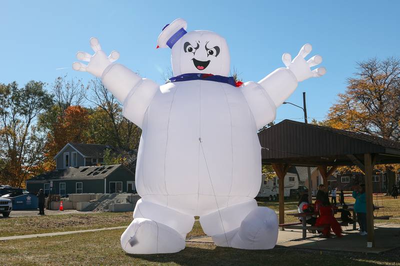 Peru Mayor, Ken Kowalski’s “Stay Puft Marshmallow Man” inflatable stands at the annual trick or treat at Washington park on Saturday, October 26, 2024 in Peru.