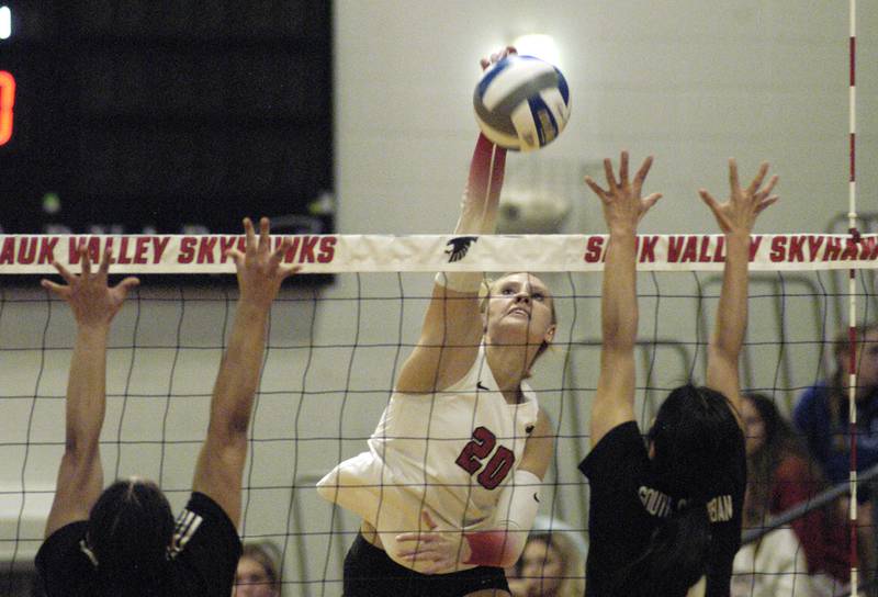 SVCC player Lacey Eissens powers  the ball past two SSC defenders. Sauk Valley College beat South Suburban College in three sets Wednesday, November 6, 2024 at Sauk Valley Community College.