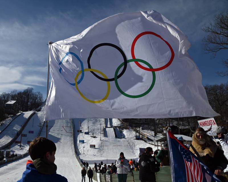 Colin McWilliams, 12, a sixth-grader from Crystal Lake holds the Olympic flag for the opening ceremony of the Norge Ski Jump 121st Annual Winter Tournament on Feb. 1, 2026 at the Norge Ski Club, 100 Ski Hill Road, Fox River Grove.