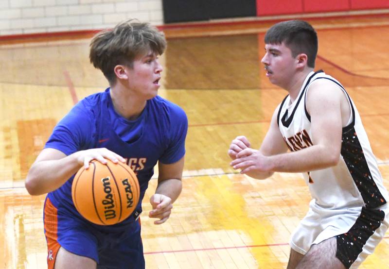 Genoa-Kingston's Conner Harney  (13) dribbles against Warren at the 64th Annual Forreston Holiday Basketball Tournament held at Forreston High School on Saturday, Dec. 13, 2025.