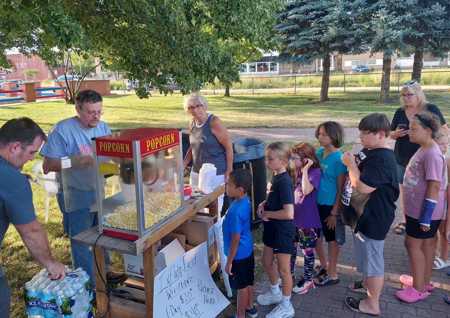 The Marseilles Fun Days Committee handed out free popcorn during a magic show, movie night and reptile show Monday, June 24, 2024, in Knudson Park as part of Fun Days.