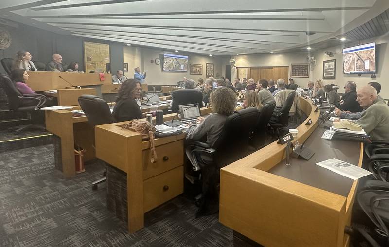 Members of the La Salle County Board vote on a resolution Thursday, Feb. 8, 2024, to declare La Salle County as a non-sanctuary county regarding migrants.