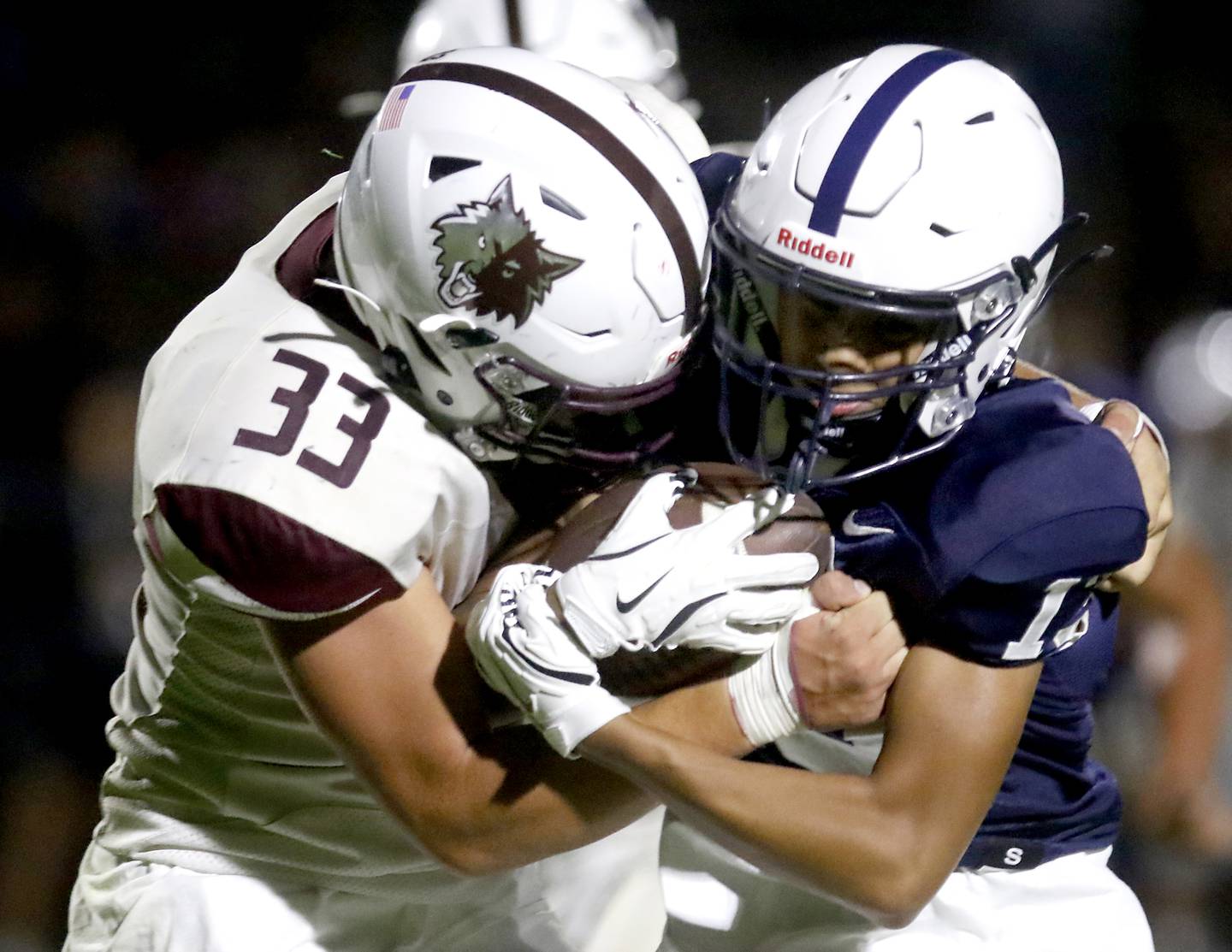 Prairie Ridge's Ethan Hart tackles Cary-Grove's Diego Guerrero for a loss during a Fox Valley Conference football game on Friday, Aug. 29, 2025, at Cary-Grove High School in Cary.