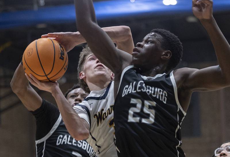 Sterling’s Jack Saathoff goes up to the hoop against Galesburg’s Keigen Crummer (left) and Eden Mayala Tuesday, Feb. 10, 2026.