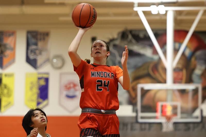 Minooka’s Madelyn Kiper puts up a shot against Romeoville on Tuesday January 24th, 2023.