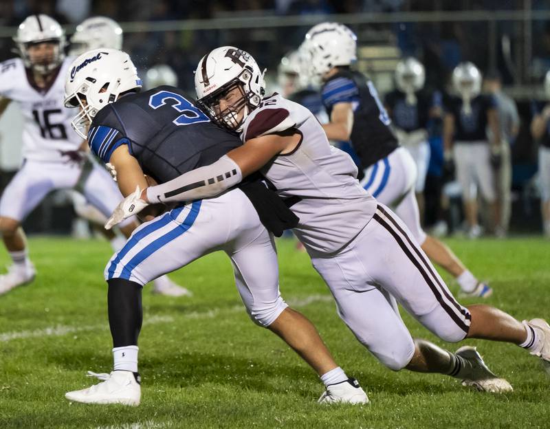 Prairie Ridge's Hunter Mosolino sacks Burlington Central quarterback Landon Arnold during their game on Friday, September 19, 2025 at Burlington Central High School. Ryan Rayburn for Shaw Local