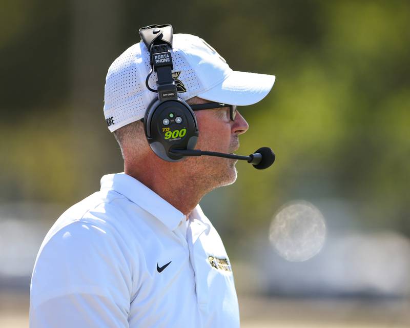 Sycamore head coach Joe Ryan looks on during the fourth quarter on Saturday Sep. 2, 2023, while traveling to Gately Stadium in Chicago to take on Simeon.