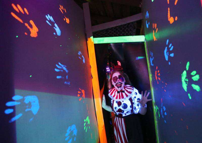 A clown character greets visitors during the Nightmare Haunted Attraction on Saturday, Oct. 14, 2023 at the Bureau County Fairgrounds in Princeton.
