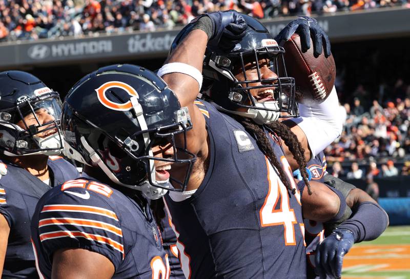 Chicago Bears linebacker Tremaine Edmunds celebrates with teammates after intercepting a Las Vegas Raiders pass during their game Sunday, Oct. 22, 2023, at Soldier Field in Chicago.