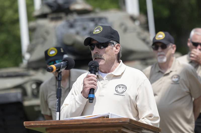 Dixon Veterans Park commissioner Keene Hudson reads off the names on the newest legacy stones Sunday, June 8, 2025, in Dixon.