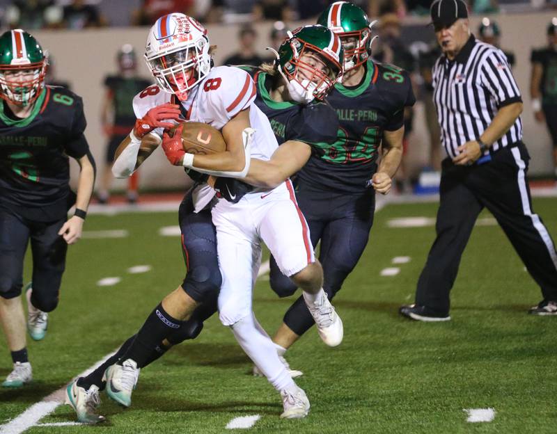 Ottawa's Bryson Valdez is brought down by L-P's Mason Morscheiser on Friday, Oct. 3, 2025 at Howard Fellows Stadium.