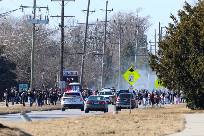 Kankakee High School students begin leaving the school for a walkout in protest of national immigration policies and Immigration and Customs Enforcement actions on Friday, Feb. 13, 2026.
