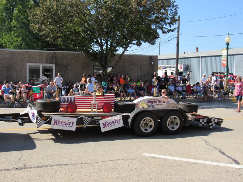 The two crackerbox derby winners make their way down Liberty Street.