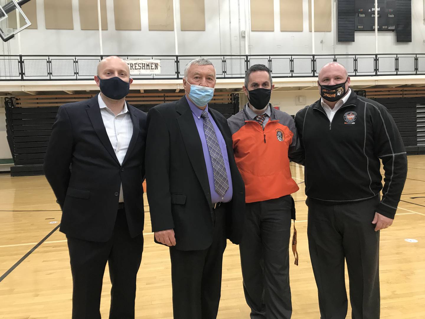 McHenry High School East Campus Principal Jeff Prickett, second from right, is named Illinois High School Principal of the Year for 2021. He is pictured here with, from left to right, Jason Ivy of Horace Mann Educators Corporation,  Frank Conroy from Illinois Principals Association and McHenry High School District 156 Superintendent Ryan McTague.