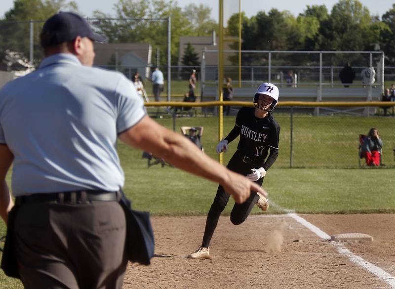 Huntley's Katelyn Bayness rounds third base on the way to score a run during a Fox Valley Conference softball game against Hampshire on Thursday, May 14, 2026, at Huntley High School.