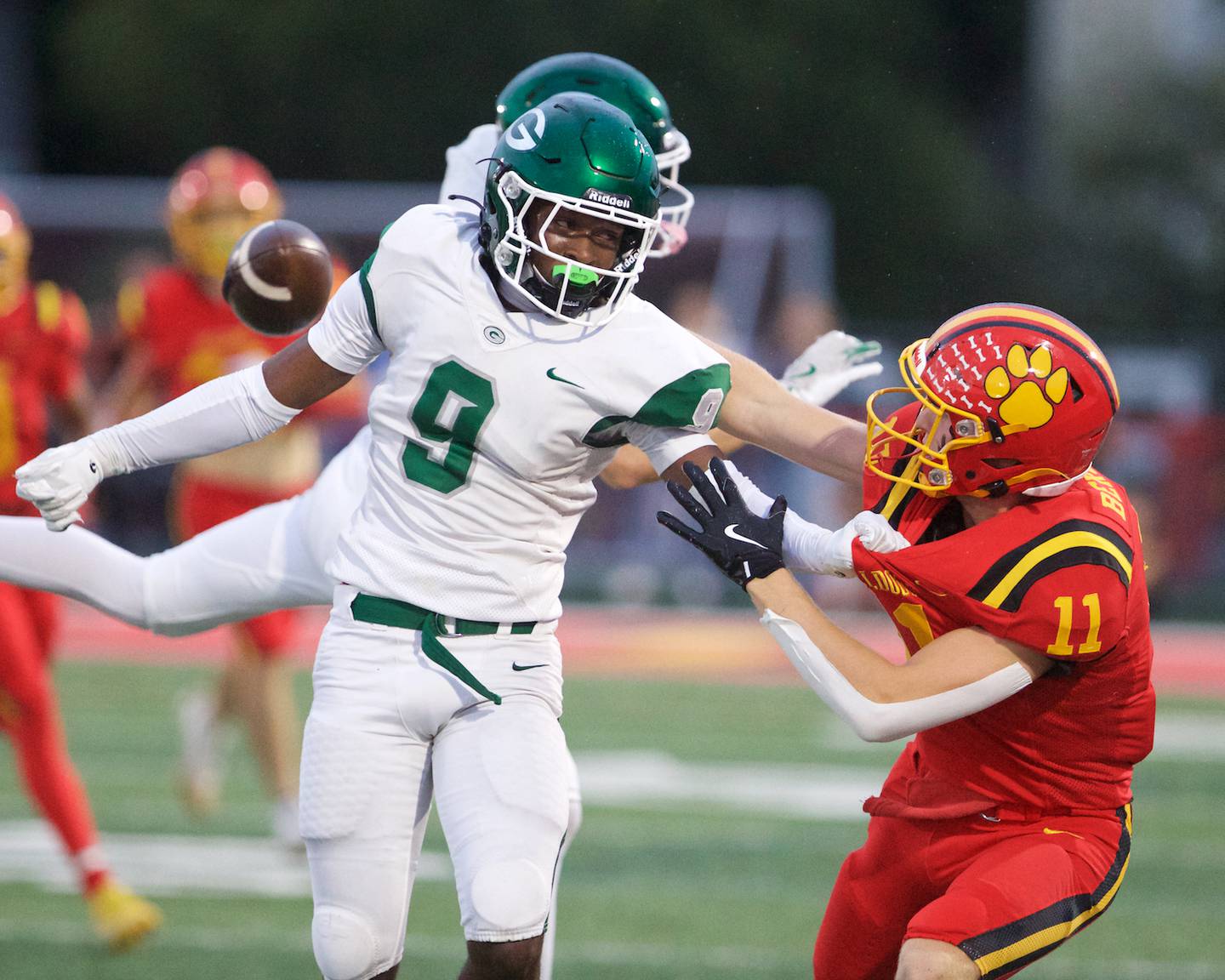 Glenbard West's Jaylen McMiller blocks the pass to Batavia's' Brett Berggren on Friday, Aug.29,2025 in Batavia.