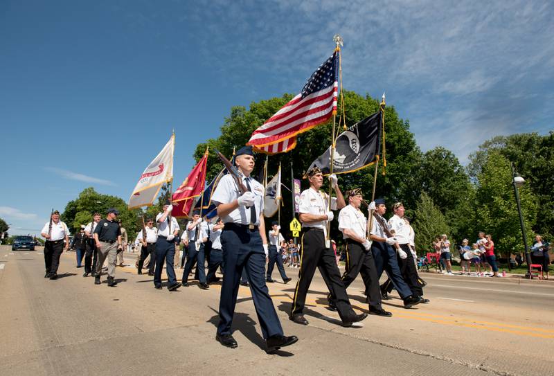 St. Charles Memorial Day Parade Color Guard heads up the procession down Main Street on Monday, May 29, 2023.