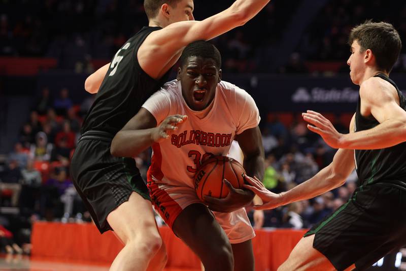 Bolingbrook’s Michael Osei-Bonsu powers to the basket against Glenbard West in the Class 4A semifinal at State Farm Center in Champaign. Friday, Mar. 11, 2022, in Champaign.