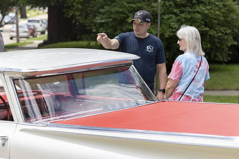 James and Cyndi Law of Dixon check out a 1959 El Camino Friday, July 5, 2024 at the Petunia Fest car show. The show, held at John Dixon Park, featured a few dozen hot rods, muscle cars, trucks and modern speedsters including James’ own 2019 Corvette.
