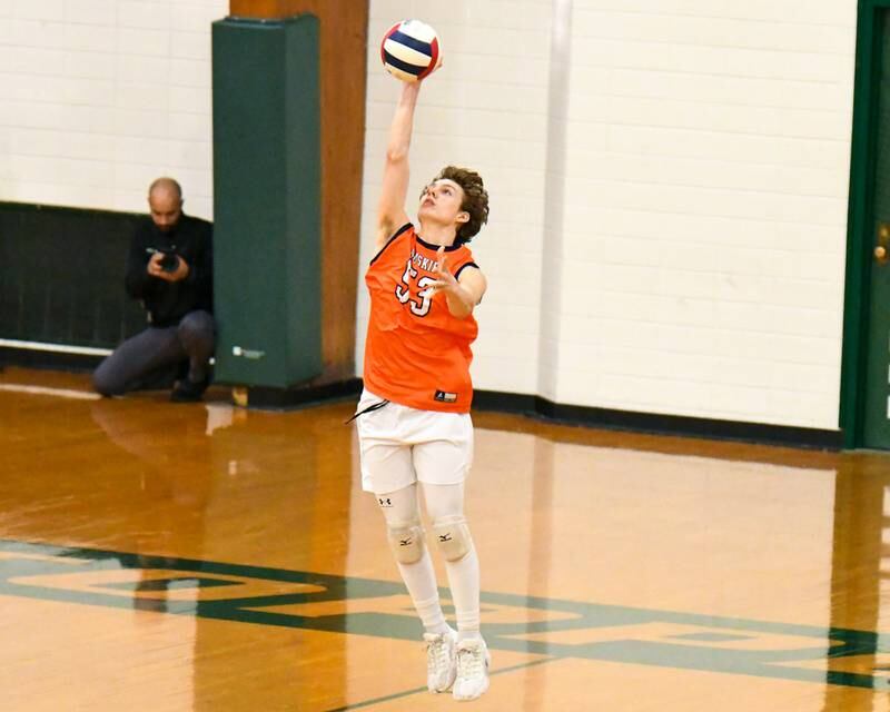 Oak Park-River Forest's August Leman (53) serves the ball during the game on Tuesday April 16, 2024, while traveling to take on Glenbard West High School.