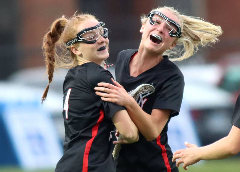 Huntley’s Mya Holmberg, left, and Lauren Cardinal celebrate a Holmberg goal in IHSA Sectional Title Game action at Crystal Lake Central High School in Crystal Lake on Friday, May 30, 2025.