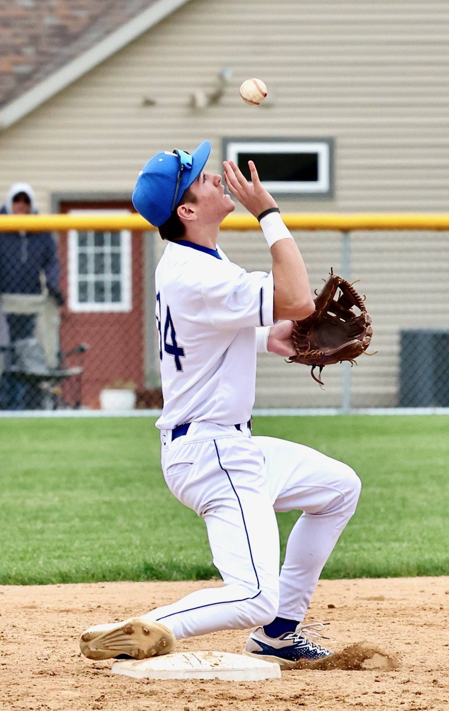 Princeton short stop finds the handle on a throw to second against Newman Tuesday at Prather Field. The Comets won 9-1.