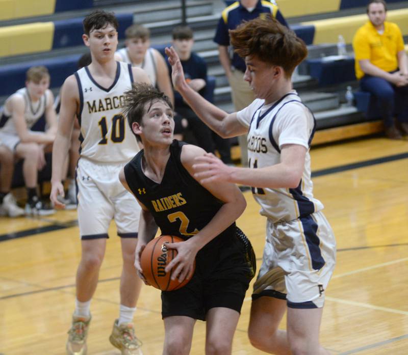 Ashton-Franklin Center's Noah Danielson gets ready to shoot as Polo's Nolan Hahn defends on Tuesday, Jan. 2, 2024 at Polo High School.
