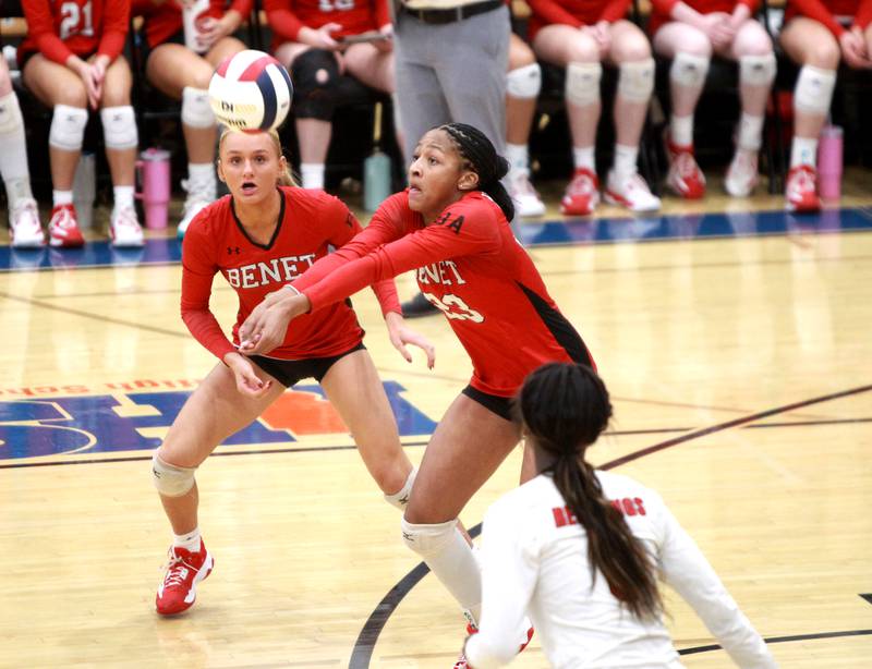 Benet’s Brooklynne Brasse returns the ball as teammate Morgan Asleson looks on during the Class 4A St. Charles North Supersectional on Monday, Nov. 11, 2024 against New Trier.