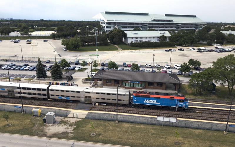 The UP Northwest Metra line has a station at Arlington Park in Arlington Heights.