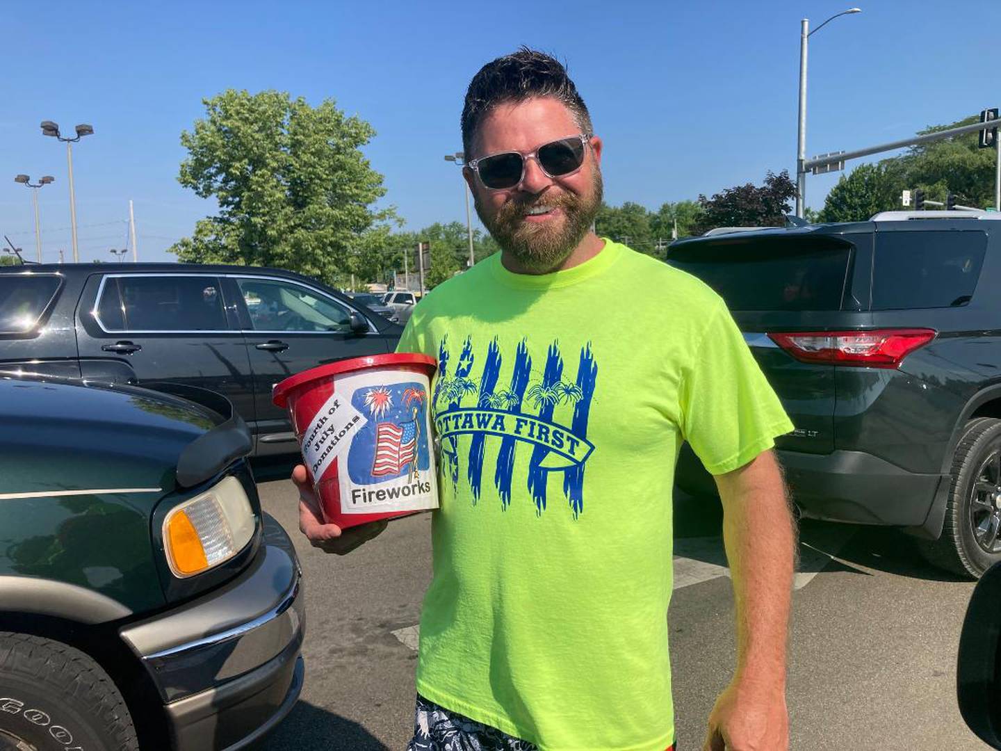 Longtime Ottawa First volunteer James Less helped collect donations recently at Columbus Street and Norris Drive for Ottawa’s annual fireworks show.