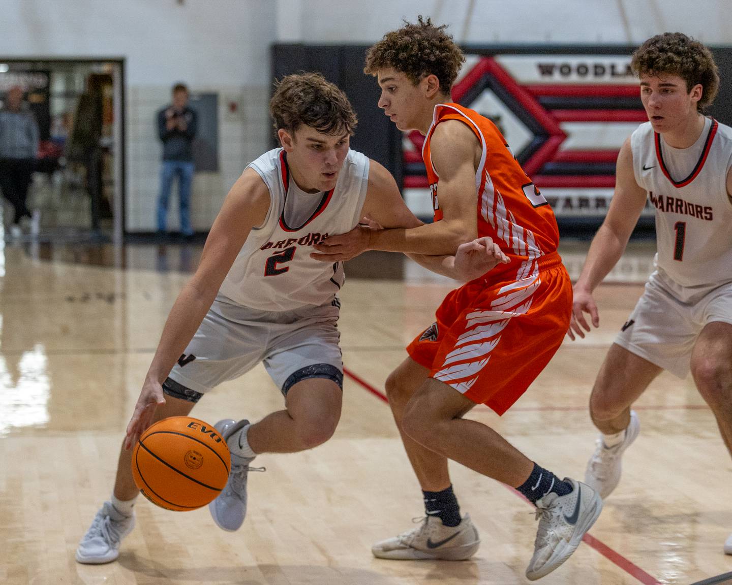 Nolan Price (2) of Woodland dribbles ball as Eli Kapraun (30) of Flanagan-Cornell defends on in a game earlier this season at Woodland High School in South Streator.