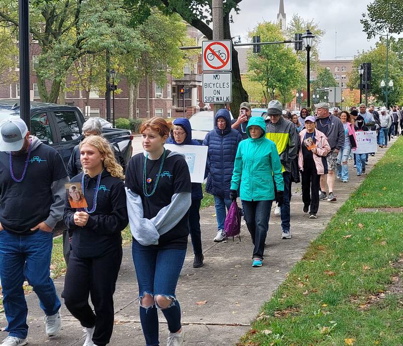 Hundreds of walkers participate in the Out of the Darkness Walk on Saturday, Oct. 14, 2023, at Washington Square in Ottawa.