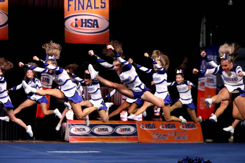 Members of the St. Francis cheerleading team compete in the small team division of the IHSA State Finals on Saturday, Feb. 8, 2025 at Grossinger Motors Arena in Bloomington.