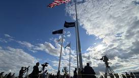 Photos: Raynor flies giant American flag