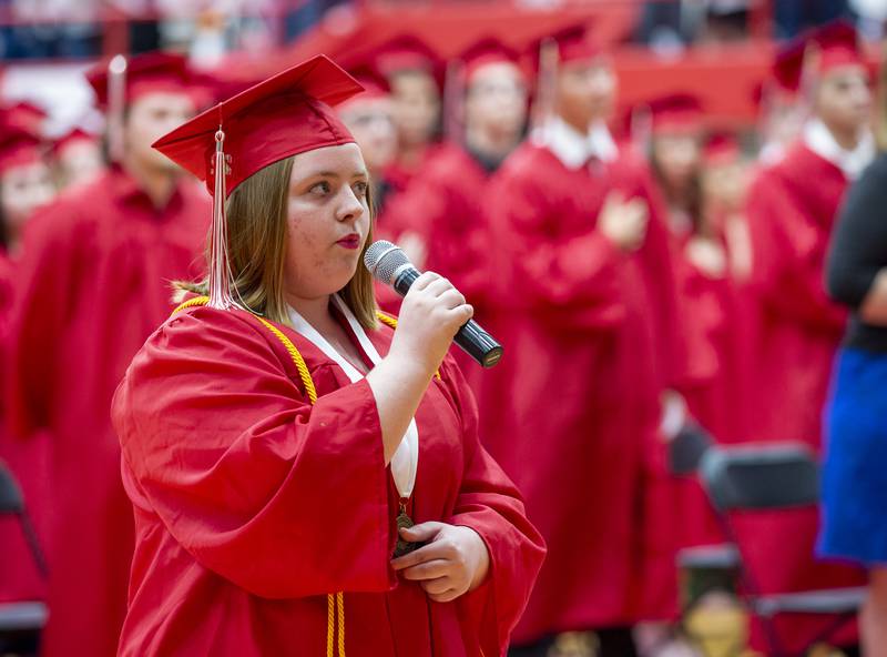 Emi Taylor sings the "Star Spangled Banner" to open the 144th Annual Commencement of Ottawa High School, Friday, May 27, 2022.