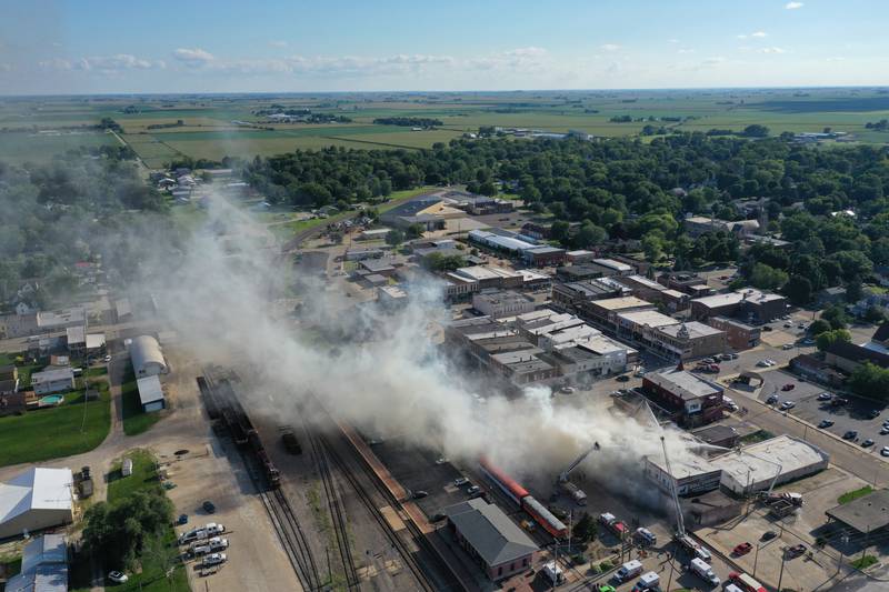 A long smoke trail can be seen from above after an apartment caught fire in the 800 block of Main Street on Monday, Aug. 22 2022 in Mendota.