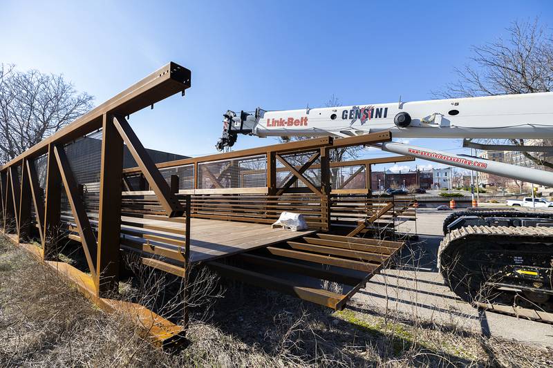 Pedestrian bridge spans sit in a parking area in Sterling Monday, April 6, 2026.