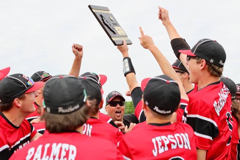 Erie-Prophetstown celebrate their 5-2 victory over Bureau Valley in Monday's regional championship at Princeton.
