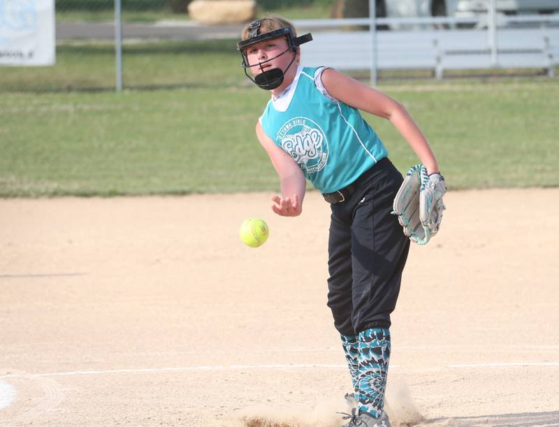 Edge's Caitlyn Woods lets go of a throw to Warriors during the Ottawa Girls Fastpitch Association 11U City Championship on Wednesday July 2, 2025 at Peck Park in Ottawa.