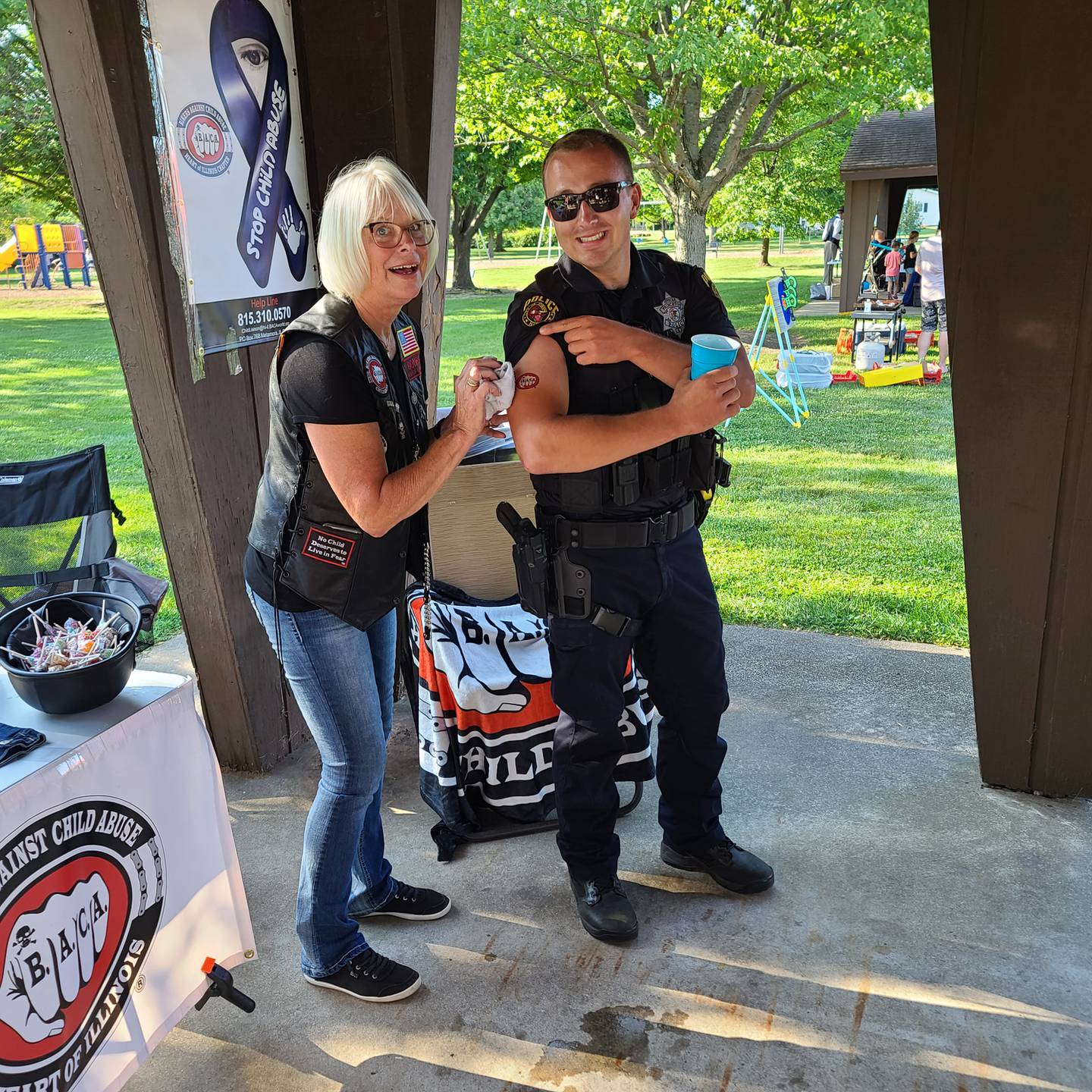 Princeton Police Officer Michael Kernan got a little (temporary) ink from Biker's Against Child Abuse member 'Bones' at National Night Out, the annual event build to foster community/police relations.