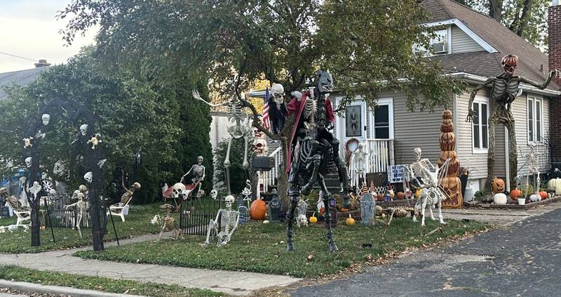 A large Halloween display features lots of skeltons in the 2400 block of Second Street on Monday, Oct. 27, 2025 in Peru.