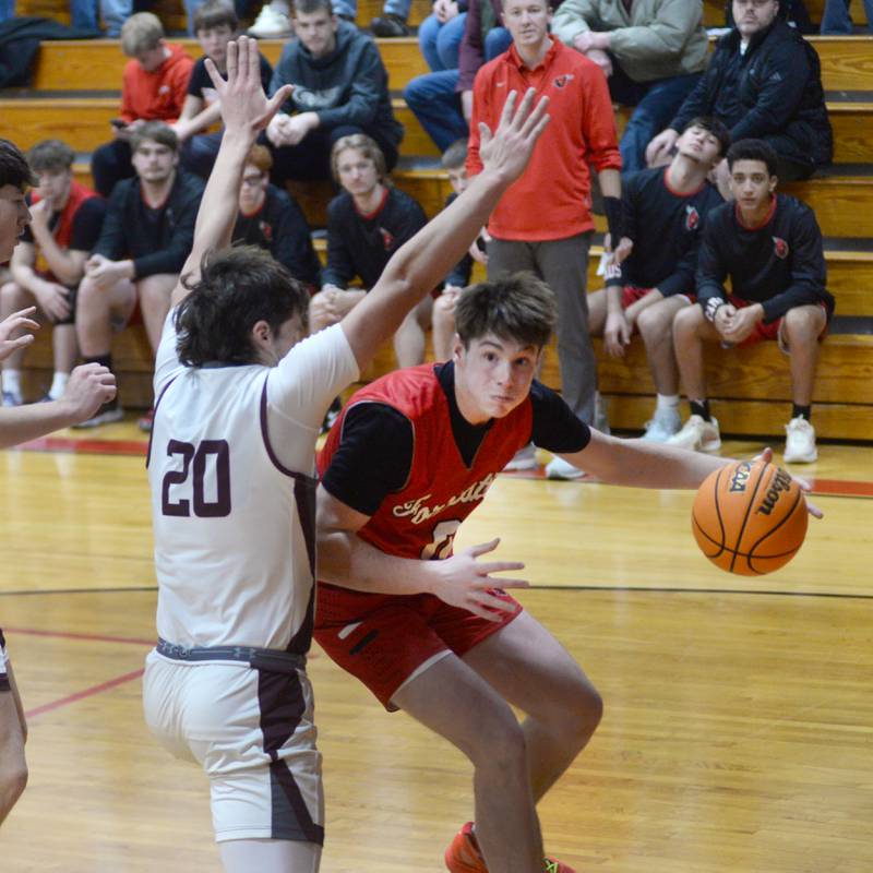 Forreston's Brendan Greenfield (0) makes a move to the basket against Dakota on Tuesday, Dec. 17, 2024 at the 63rd Annual Forreston Holiday Tournament.